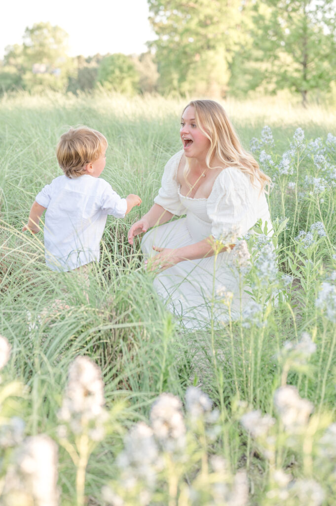 Boy Running to mom by holly springs family photographer