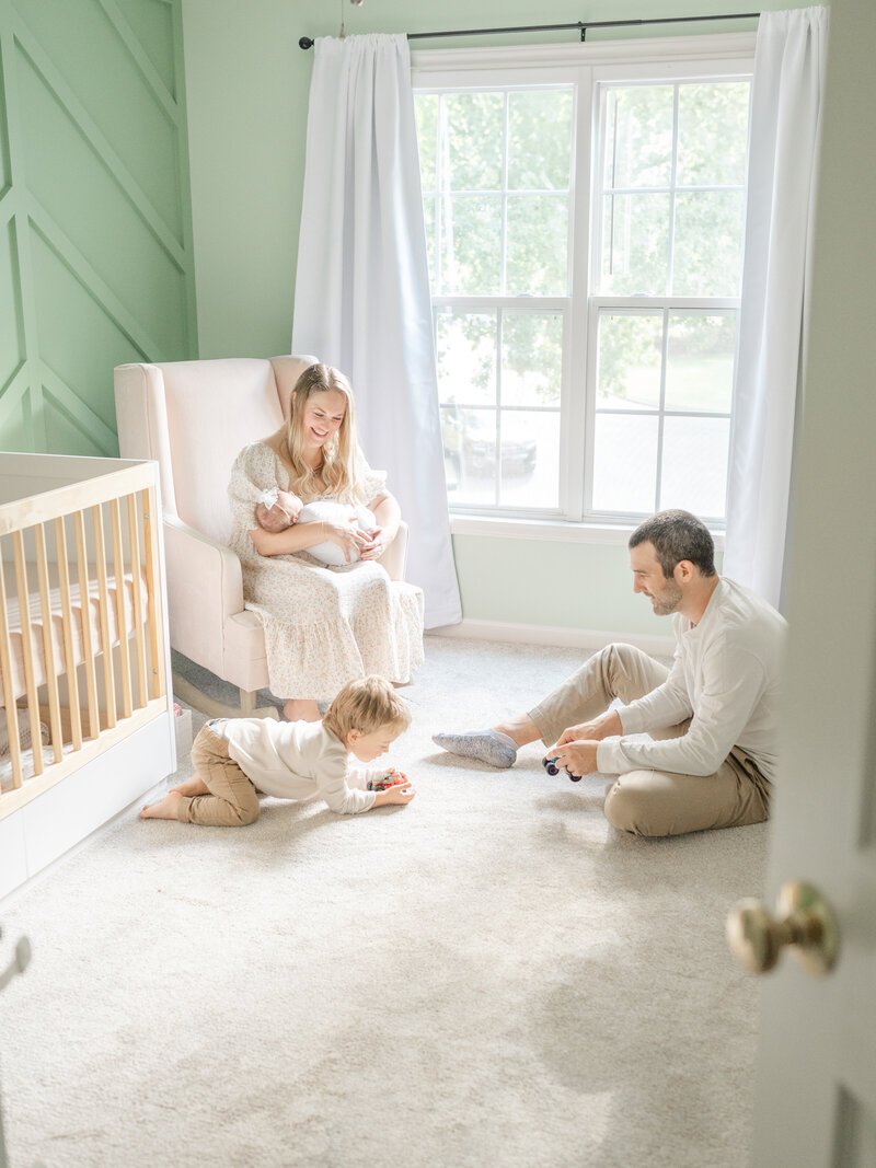family with newborn by newborn photography raleigh